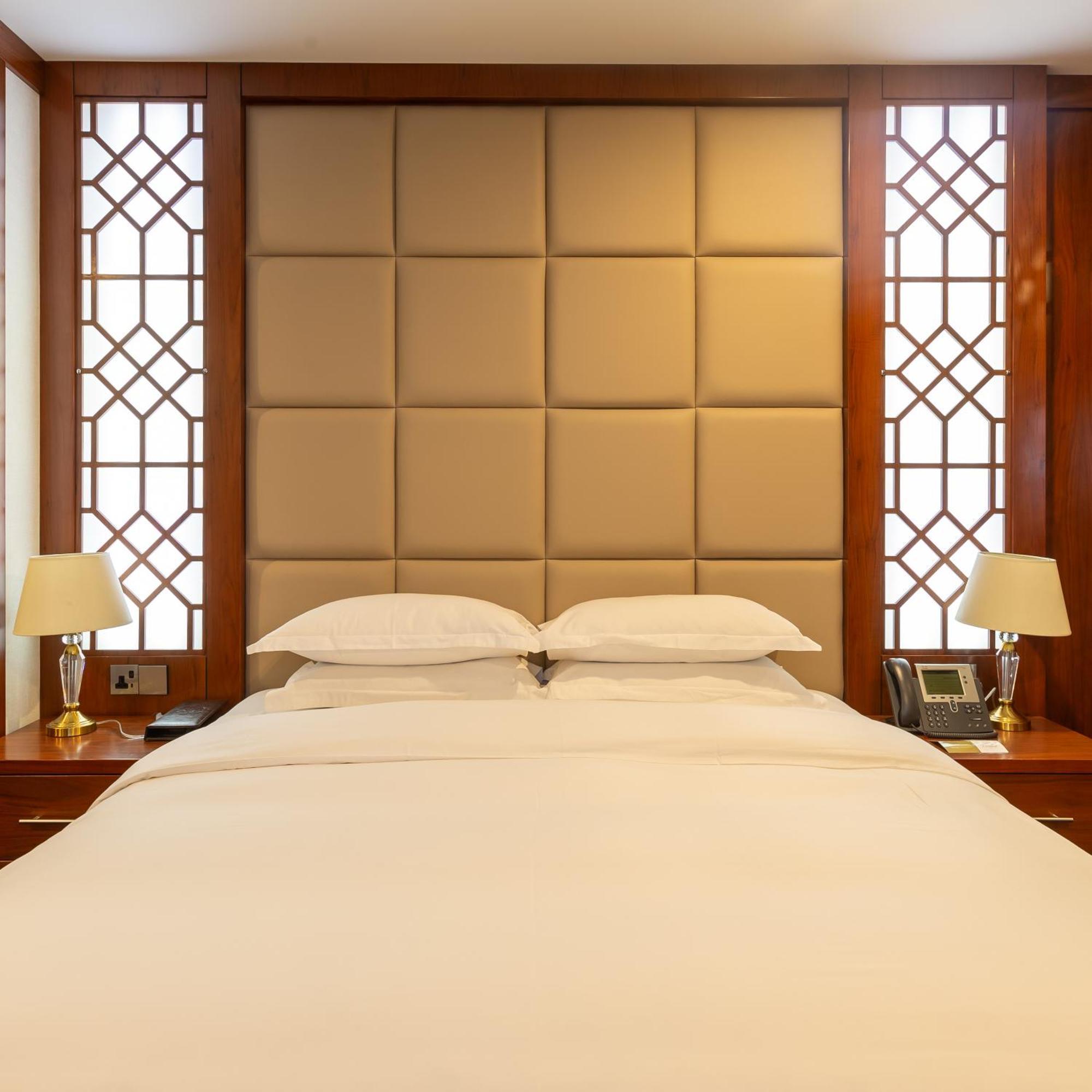Cristal Erbil Hotel Экстерьер фото A bed